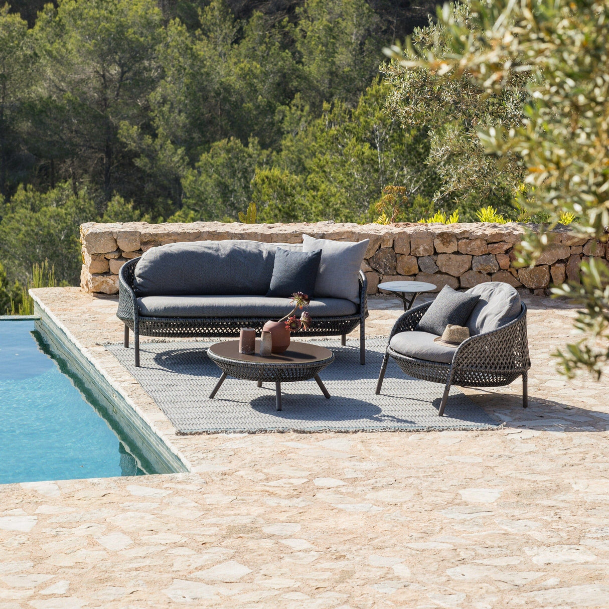 Dedon Ahnda Coffee Table avec plateau en verre